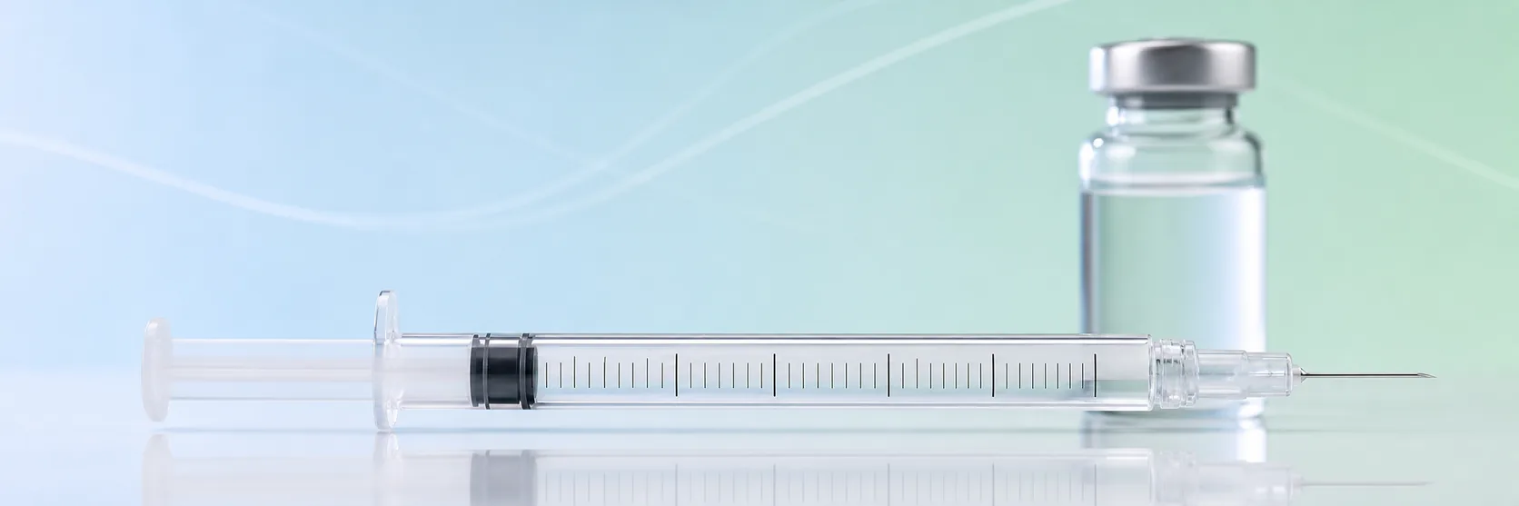 U-100 insulin syringe with a graduated barrel beside a vial of reconstituted peptide, showing that syringe units are volume markings